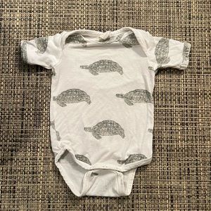 Kate Quinn Turtle Onesie